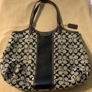 Black and brown Coach handbag